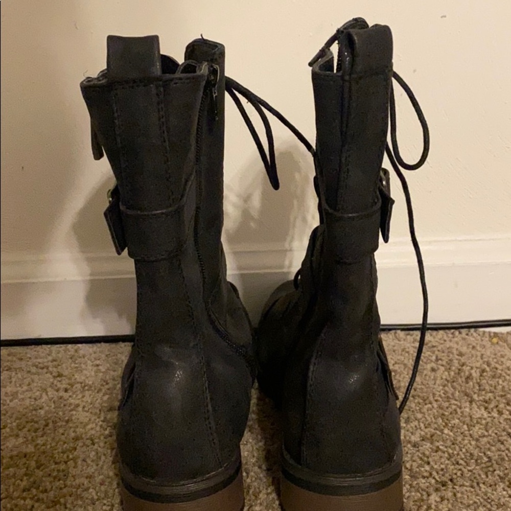 Black buckle combat boots